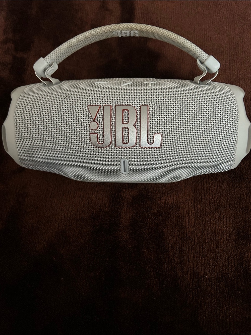 JBL Portable Bluetooth Speaker in Light Gray with Red Logo